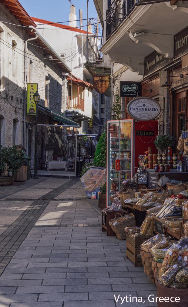 Narrow street of shops in Vytina Greece