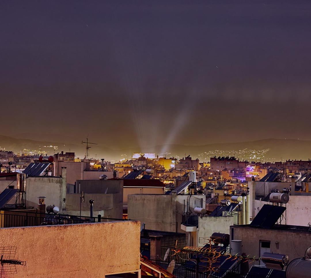 Lights of the Acropolis shining out in Athens at night