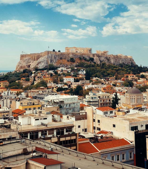 Parthenon and Acropolis in Athens under sunny and cloudy skies