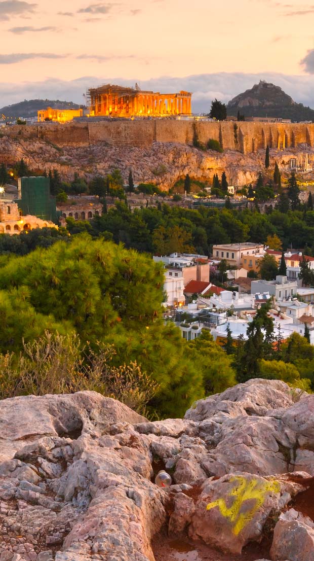 Parthenon and Acropolis as sunset comes into Athens Greece