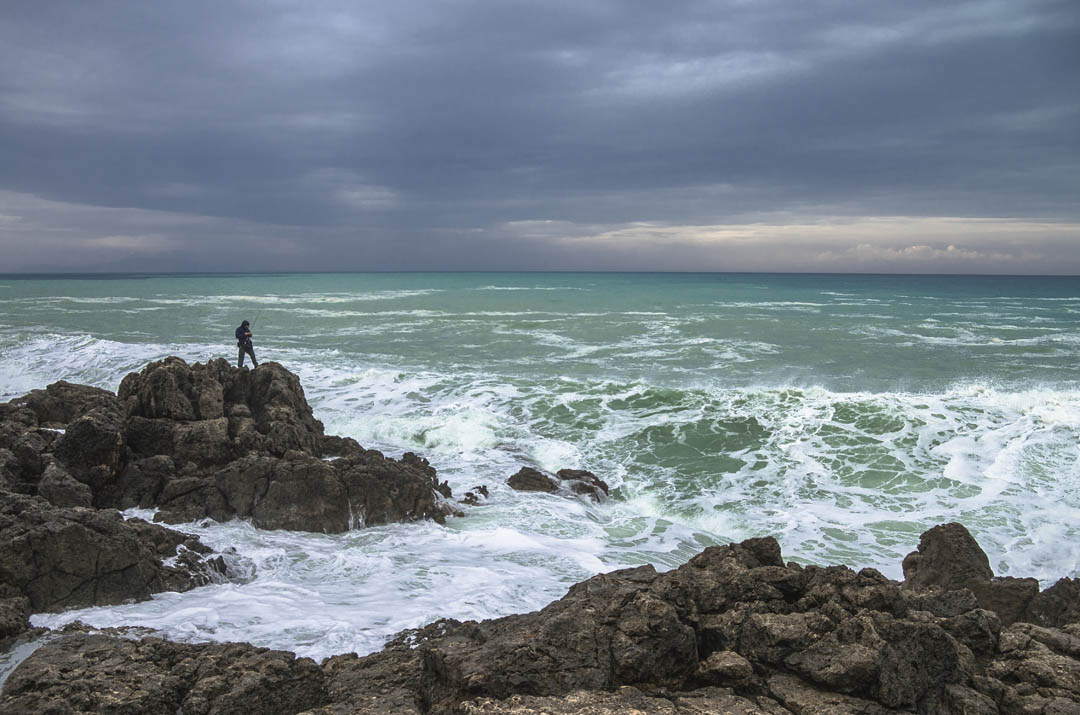 Fishing on the coast of Greece in winter