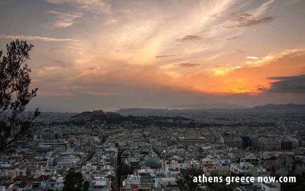 Sunrise over Athens Greece from Lycabettus - Pireaus in distance