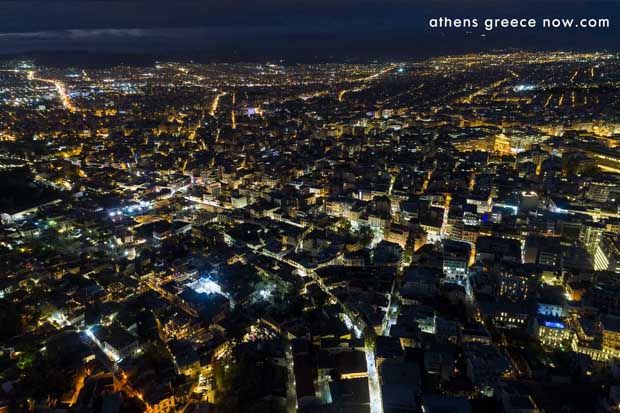 Night time over Athens Greece looking toward Pireaus