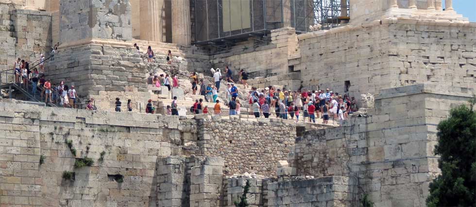 Tourists walking across Acropolis