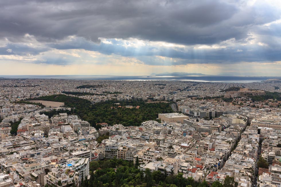 Aerial view over Athens  with Piraeus in distance