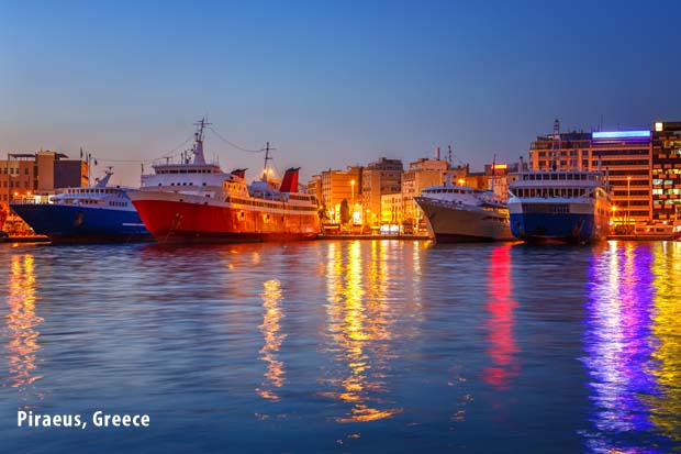 Piraeus at night with cruise ships