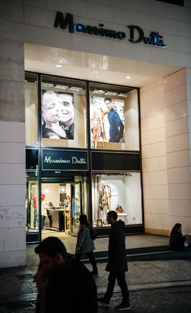 Massimo Dutti luxury store in central Athens at dusk