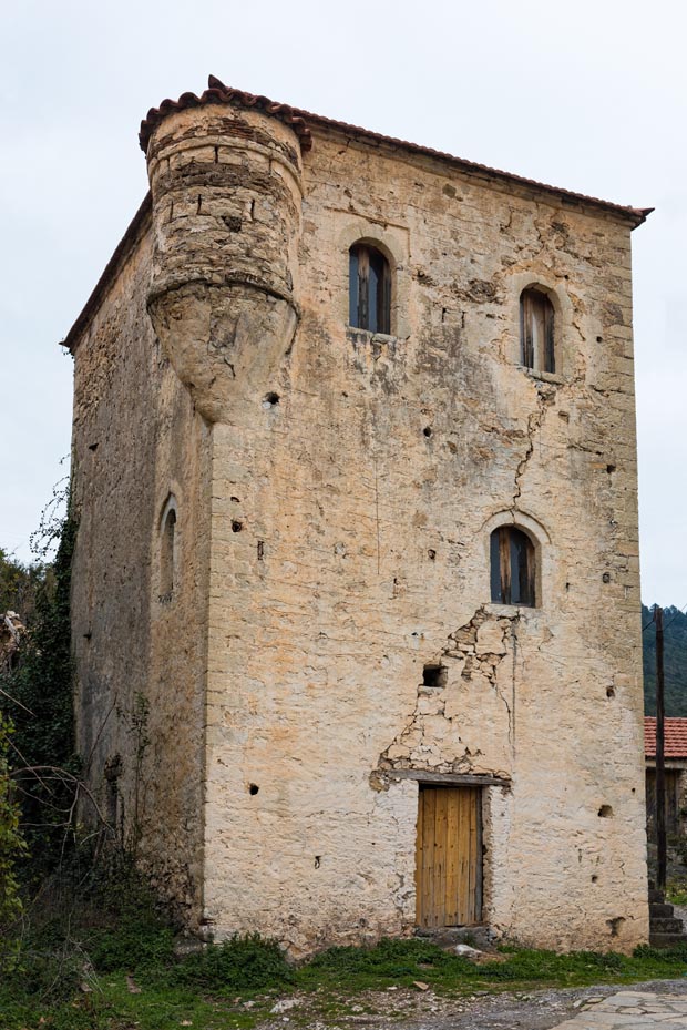 Ancient building with turret in the village of Agios Vassilios in the  Peloponnese