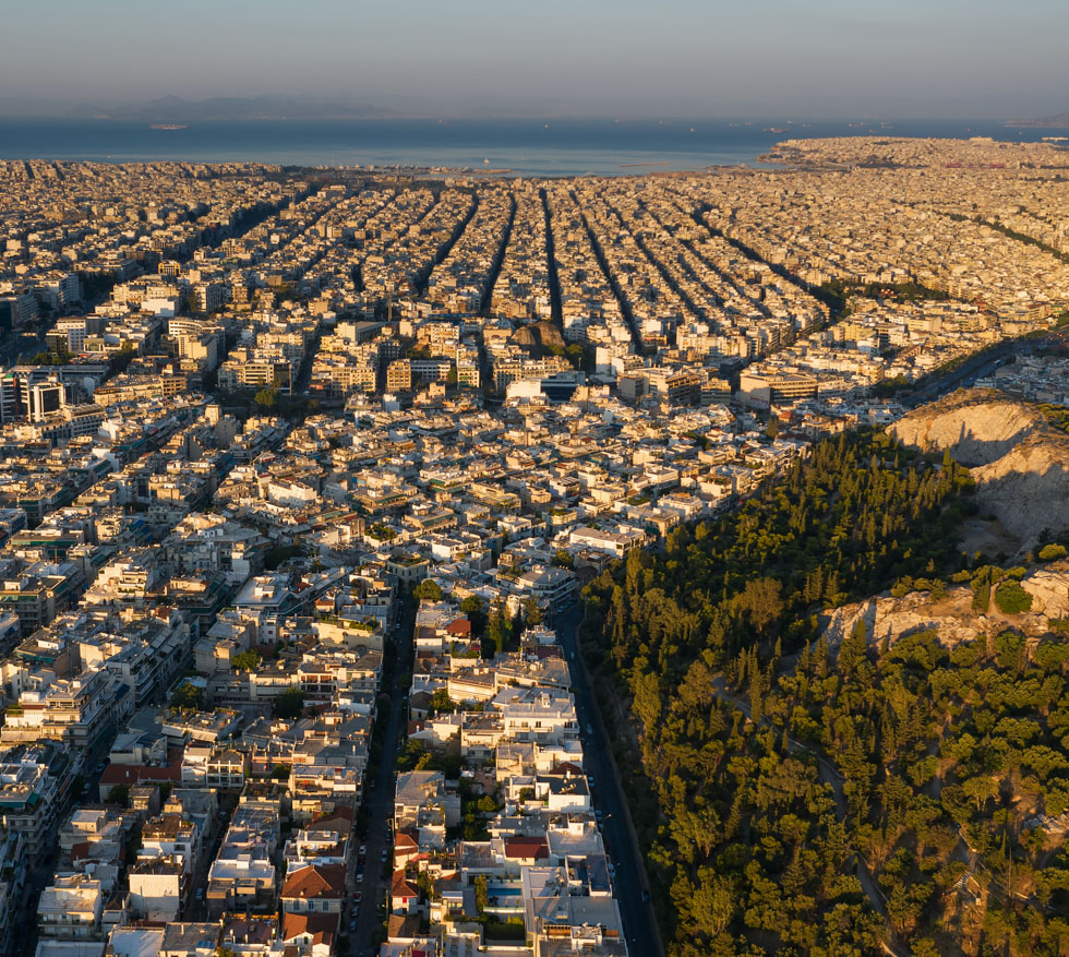 Athens with Piraeus in the distance with Saronic Gulf